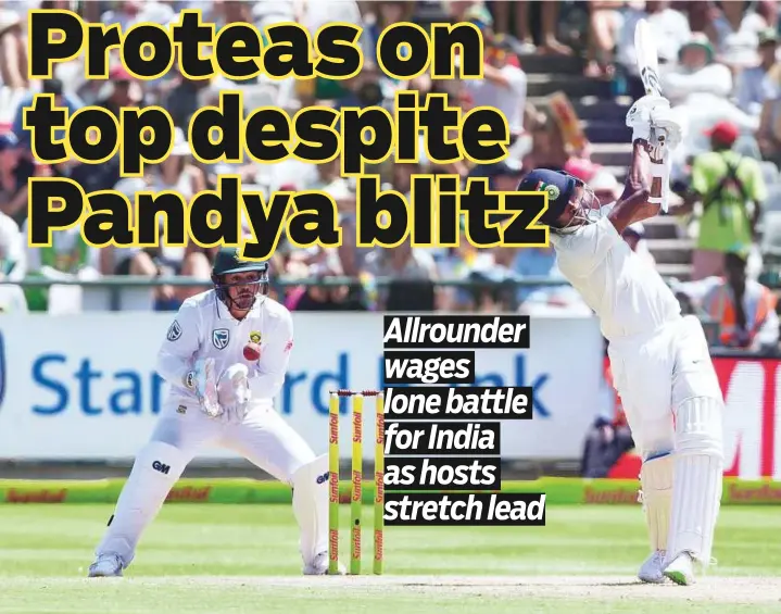  ?? AP ?? Hardik Pandya swings and misses the ball off the bowling of Keshav Maharaj while wicketkeep­er Quinton de Kock of South Africa keeps his eye on the ball, at Newlands Stadium in Cape Town.