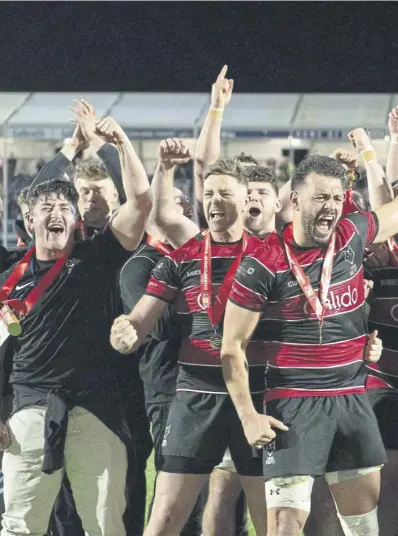  ?? ?? Stirling Wolves lift the Super Series trophy after beating Ayrshire Bulls in November. Right: Al Kellock. Left: Tom Jordan of Glasgow Warriors