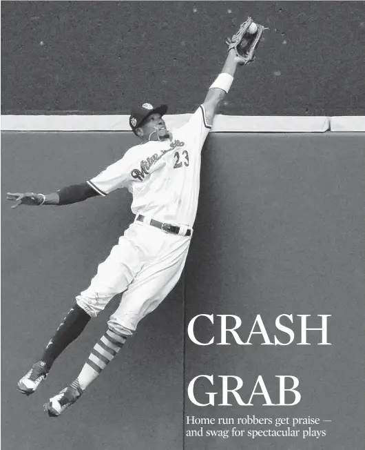  ?? MORRY GASH/AP ?? Brewers outfielder Keon Broxton robs the Twins’ Brian Dozier of a homer in the ninth inning of a game last season. “We’re out there to catch the uncatchabl­e,” Broxton said.