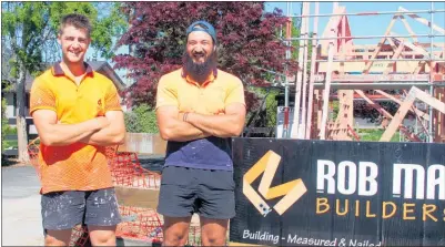  ?? Photo / Bethany Rolston ?? Builder Isaac Vandervalk (right) and apprentice builder Matt Oliver, of Rob May Builders, do their best to save leftover materials during each build.