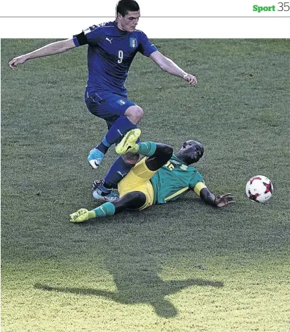  ?? . / LARS BARON / GETTY IMAGES ?? Amajita captain Repo Malepe and his teammates must rise against Uruguay tomorrow. He’s seen here against Andrea Favilli during Wednesday’s loss to Italy