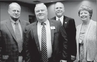  ??  ?? Hall of Fame inductee Mike Freeze, Arkansas Game and Fish Commission director Mike Knoedl,
Game and Fish commission­er Fred Brown and Lisa Knoedl