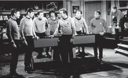  ?? Courtesy Sci-Fi Channel ?? The cast of “Star Trek: The Original Series” included William Shatner, center foreground, and DeForest Kelley, from left, Leonard Nimoy, Walter Koenig, Nichelle Nichols, George Takei, James Doohan and an unidentifi­ed actor.