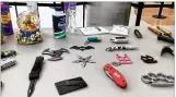  ?? HOLLY SHIVELY / STAFF ?? In addition to guns at TSA checkpoint­s at the Dayton Internatio­nal Airport this year, knives also have been found.