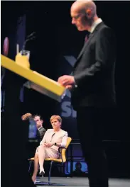  ??  ?? Conference First Minister Nicola Sturgeon looks on as deputy FM John Swinney MSP speaks