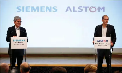  ??  ?? Siemens and Alstom announcing their rail merger in 2017, which was blocked by the EU competitio­n authority. Photograph: Stéphane Mahé/Reuters