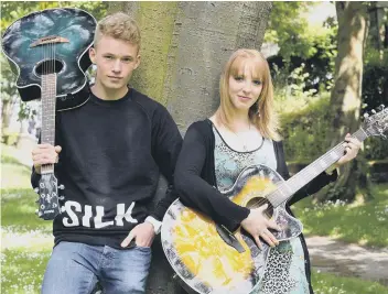  ??  ?? CLASS ACT: YCC musicians Connor Lawlor and Sophie Norris performed at the Open Air Theatre.