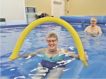  ??  ?? Sue Moore and Walter McCombe using the hydrothera­py pool