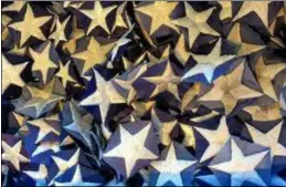  ?? PHOTO PROVIDED ?? Stars For Our Troops distribute­s thousands of stars each year.