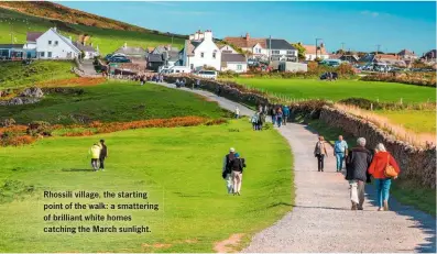  ??  ?? Rhossili village, the starting point of the walk: a smattering of brilliant white homes catching the March sunlight.