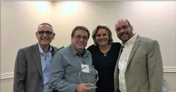  ??  ?? FrOM lEFT: San Diego regional Center Executive Director Carlos Flores; Alex King, ArC iV; Terri Colachis, SDrC board member and chair of the ArCA board of directors; Arturo Santos, ArC iV chief executive officer.