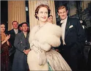  ?? ROBERT VIGLASKY/NETFLIX VIA AP ?? Claire Foy, center, and Matt Smith, right, star in “The Crown.”