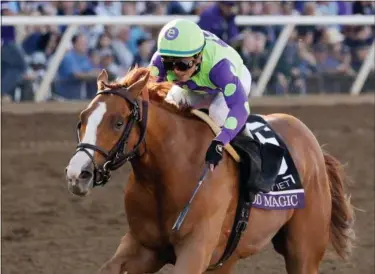  ?? GREGORY BULL — THE ASSOCIATED PRESS FILE ?? Jose Ortiz rides Good Magic to victory in the Sentient Jet Juvenile horse race during the Breeders’ Cup in November.