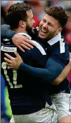  ??  ?? DELIGHT: Alex Dunbar and Ali Price celebrate Scotland’s win over Wales