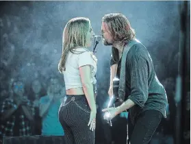  ?? CLAY ENOS THE ASSOCIATED PRESS ?? Lady Gaga, left, and Bradley Cooper in a scene from “A Star is Born.”