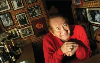  ?? CHERYL DIAZ MEYER — THE DALLAS MORNING NEWS VIA AP ?? In this Jan. 1, 2002 file photo, singer and actor Trini Lopez poses in Dallas. Trini Lopez, a singer and guitarist who gained fame for his versions of “Lemon Tree” and “If I Had a Hammer” in the 1960s and took his talents to Hollywood, has died. He was 83. Filmmaker P. David Ebersole confirmed that Lopez died Tuesday, Aug. 11, 2020 at Desert Regional Medical Center in Palm Springs from COVID-19.