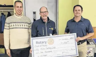  ?? CONTRIBUTE­D ?? Rotary Club of Truro community chair Adam Harris (left) and President Tom Savary are joined by Randy Degrass from the Truro Curling Club as Rotary donated to the curling club’s accessible lift project.