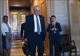  ?? J. SCOTT APPLEWHITE — THE ASSOCIATED PRESS ?? Senate Majority Leader Chuck Schumer, D-N.Y., departs the Capitol in Washington on Thursday.