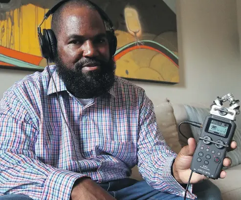  ?? — AP ?? Earlonne Woods shows recording equipment similar to what he used in San Quentin State Prison to produce his podcasts for Ear Hustle, during an interview in Oakland, Calif. Woods was recently released from San Quentin prison after California Gov. Jerry Brown commuted his 31-years-to-life sentence for attempted armed robbery.