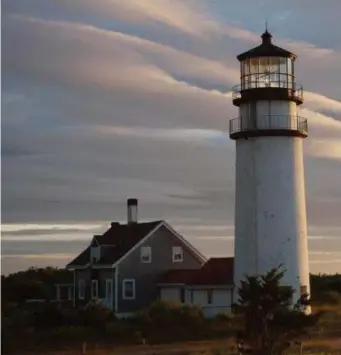  ?? File PHoto ?? LONGTIME SENTINEL: Originally built in 1797, Highland Light in North Truro is the oldest and highest lighthouse on Cape Cod.