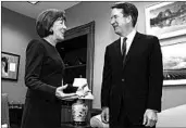  ?? JOSE LUIS MAGANA/AP ?? Sen. Susan Collins speaks with Supreme Court nominee Brett Kavanaugh at her office in Washington on Tuesday.