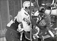  ?? AP-Bruce Bennett ?? Washington Capitals’ Tom Wilson (43) takes a roughing penalty during the second period against New York Rangers’ Artemi Panarin (10) on May 3 in New York.