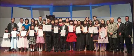  ??  ?? Winners and finalists of the Second Internatio­nal Piano Festival and Competitio­n 2016 pictured with UCSI’s vice-chancellor and president Senior Prof Datuk Dr Khalid Yusoff (third from right), UCSI Institute of Music’s director Prof Dr P’ng Tean Hwa...