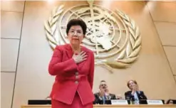  ?? — AFP ?? GENEVA: Outgoing Director General of the World Health Organizati­on (WHO), China’s Margaret Chan, gestures after delivering her last speech before the delegates on the opening day of the World Health Assembly (WHA), the WHO’s annual meeting, yesterday.