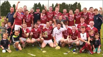  ??  ?? Liam Mellows celebrate their Division 4 league success.