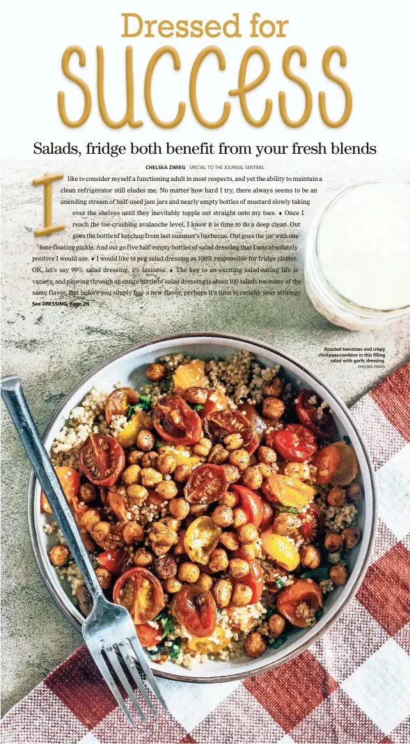  ?? CHELSEA ZWIEG ?? Roasted tomatoes and crispy chickpeas combine in this filling salad with garlic dressing.