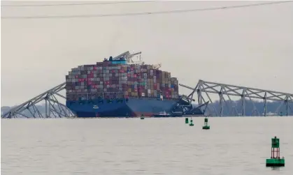  ?? Photograph: Matt Rourke/AP ?? A container ship rests against wreckage of the Francis Scott Key Bridge on Wednesday, 27 March 2024.