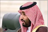  ?? (AP Photo/Alexander Zemlianich­enko, Pool, File) ?? Saudi Arabia’s Crown Prince Mohammed bin Salman speaks to Russian President Vladimir Putin during talks Oct. 14, 2019, in Riyadh, Saudi Arabia.