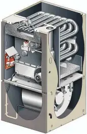  ?? Photo courtesy of Maytag ?? This shows the interior of a high-efficiency condensing furnace. Notice the tubular-style heat exchangers near the top.