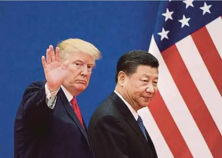  ??  ?? US President Donald Trump and Xi Jinping after a business leaders event in Beijing in November. Xi is a strong leader for China; he has addressed the nation’s most pressing problems, corruption and the pollution caused by China’s fast growth.