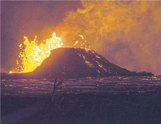  ?? GRACE SIMONEAU/THE ASSOCIATED PRESS ?? Lava erupts from a fissure in the Leilani Estates neighbourh­ood near Pahoa on the island of Hawaii.