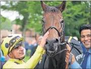  ?? ?? Jockey Andrea Atzeni celebrates Emaraaty Ana edging Starman to win the Betfair Sprint Cup at Haydock