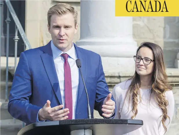  ?? JAMES WEST / THE CANADIAN PRESS ?? “Indeed we’re still the government and I’m still the premier until we lose the confidence of the house,” Liberal Leader Brian Gallant, shown here with his wife Karine, said Tuesday after meeting with New Brunswick’s lieutenant-governor.