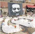  ?? JIM MONE/AP ?? George Floyd Square is shown Feb. 8 in Minneapoli­s. Ten months after Floyd’s death at the hands of police, the square remains a makeshift memorial.