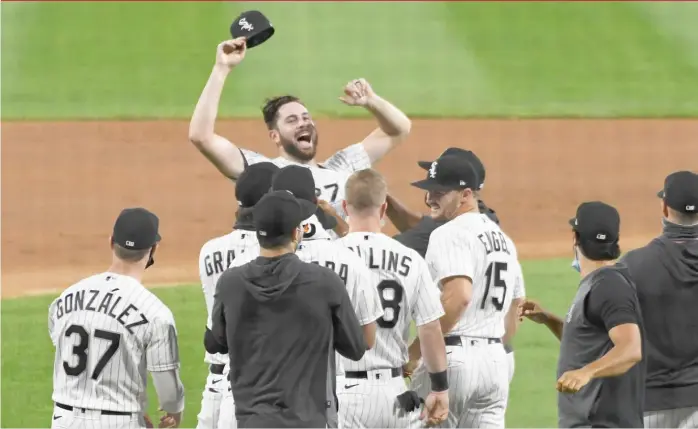  ?? DAVID BANKS/GETTY IMAGES ?? Right-hander Lucas Giolito celebrates his no-hitter against the Pittsburgh Pirates at Guaranteed Rate Field on Tuesday night. It was the White Sox’ 19th no-hitter.