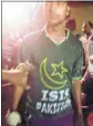  ?? HT ?? A man wearing an ISIS T-Shirt during a Moharram procession in Dhanabd on Tuesday night.