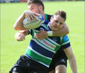  ??  ?? Gorey’s David Shannon powering over for a try which he also converted.