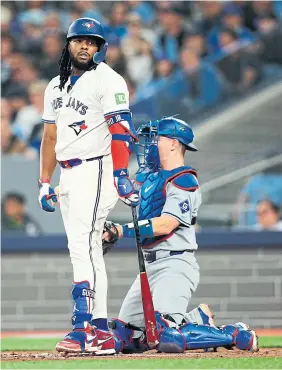  ?? R.J. JOHNSTON TORONTO STAR ?? Blue Jays slugger Vladimir Guerrero Jr. looks to the dugout after a questionab­le strike off the Dodgers’ Gavin Stone on Friday at the Rogers Centre.