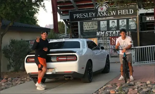  ?? Courtesy of Mario Moccia ?? Nick Gonzales, right, is known for his work ethic. He and former teammate Joey Ortiz hoped to get a workout in at New Mexico State’s Presley Askew Field after the Aggies’ season got cut short by the COVID-19 pandemic.