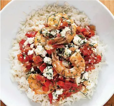  ?? [PHOTO BY DANIEL J. VAN ACKERE, AMERICA’S TEST KITCHEN/AP] ?? This recipe for Greek-Style Shrimp with Tomatoes and Feta appears in the cookbook “Complete Mediterran­ean.”