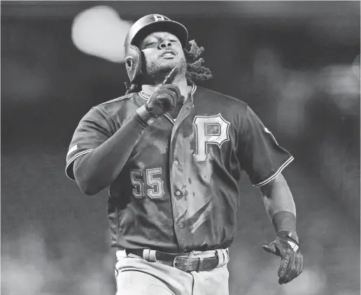  ?? JOE CAMPOREALE/USA TODAY SPORTS ?? Pirates right fielder-first baseman Josh Bell had slugged 14 home runs to go along with 44 RBI this season entering the opening series of the week.