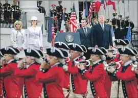  ?? Pablo Martinez Monsivais Associated Press ?? PRESIDENT TRUMP, French President Emmanuel Macron and their wives participat­e in an elaborate welcoming ceremony at the White House.