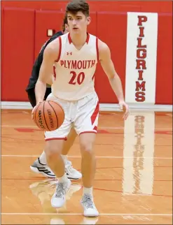  ?? PILOT PHOTO/MAGGIE NIXON ?? Plymouth senior Owen Yoder brings the ball up court against Glenn.