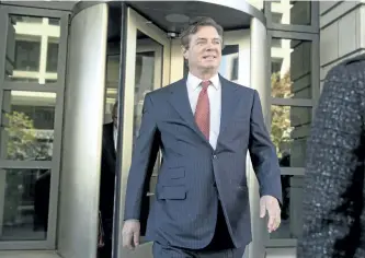  ?? ANDREW HARNIK/ THE ASSOCIATED PRESS ?? Paul Manafort, President Donald Trump’s former campaign chairman, leaves court on Thursday. His lawyers deny he was involved in any criminal activity related to his work in Ukraine, and that all of his money that went through offshore banks is from...