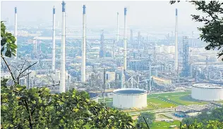  ??  ?? Thai Oil’s refinery in Sri Racha, Chon Buri. The company aims to switch from refining heavy oil with low margins to producing more high-margin products like diesel and jet fuel.