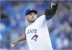  ?? TOM SZCZERBOWS­KI / GETTY IMAGES ?? Marco Estrada was sharp again for Toronto, giving up just two hits and three walks while striking out eight.